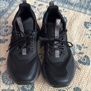 On Running Black and Gray Sneakers with Modern Silhouette
